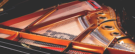 Inside view of a grand piano.