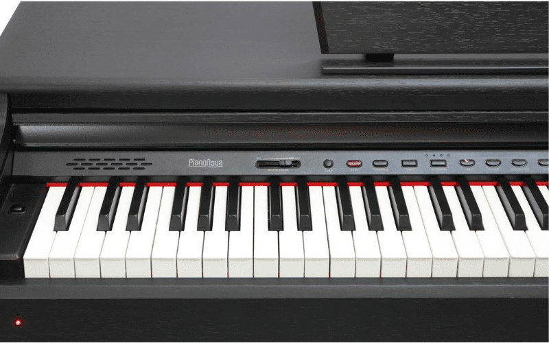 A close-up of a digital piano keyboard with control buttons.