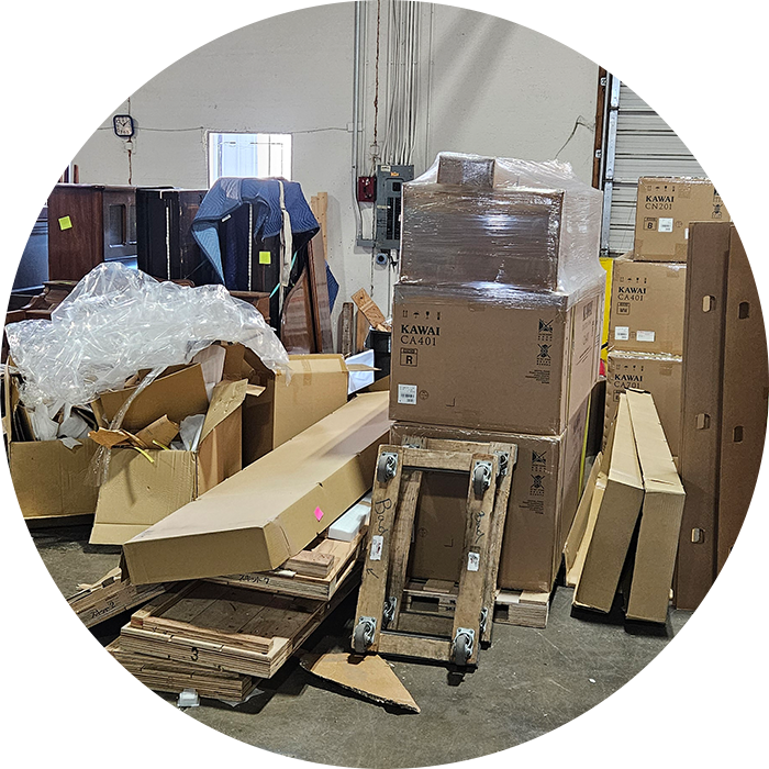 Warehouse with stacked boxes and packaging materials.