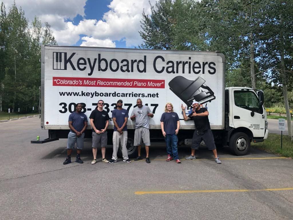 Group in front of Keyboard Carriers truck.